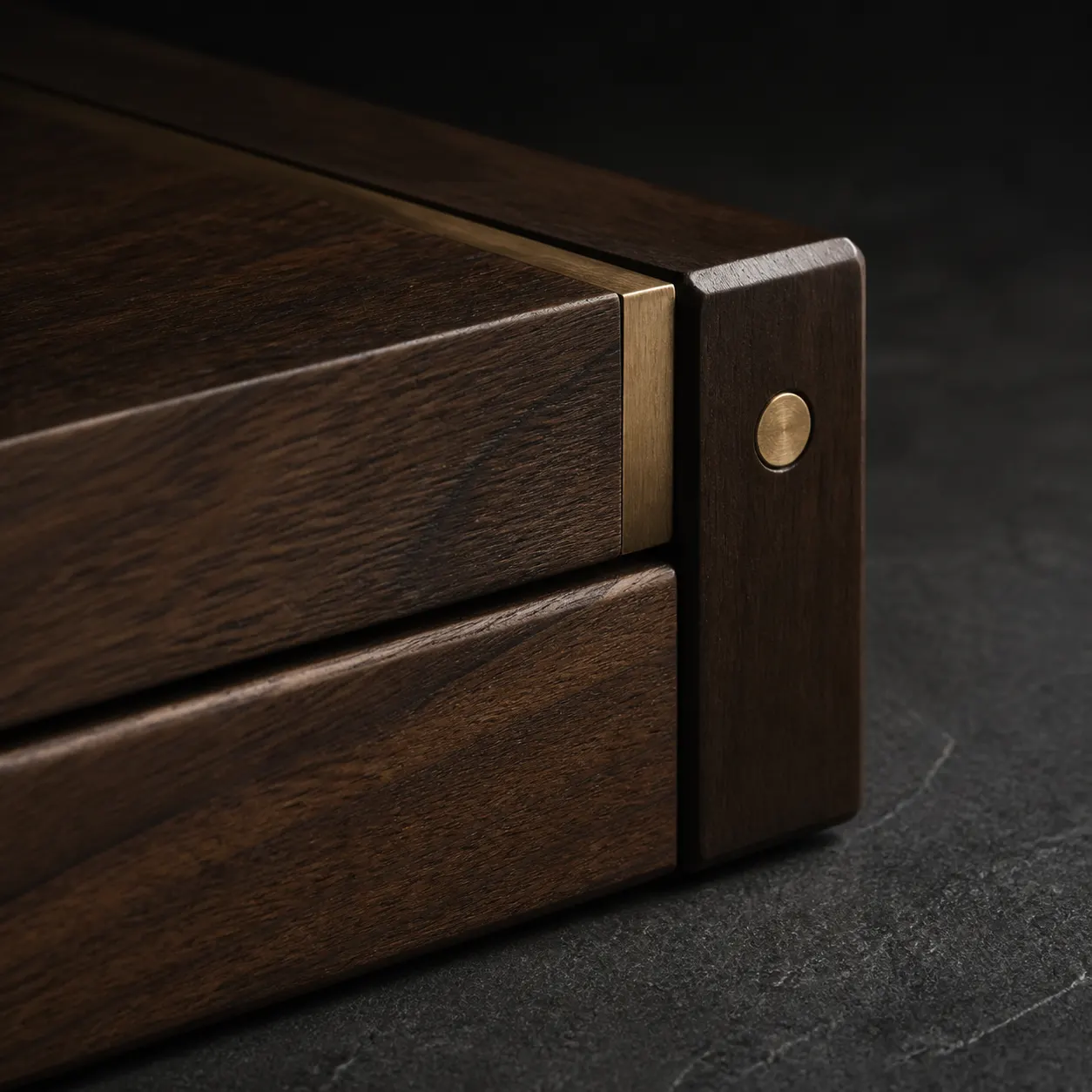 Dark walnut object with a refined aged brass detail