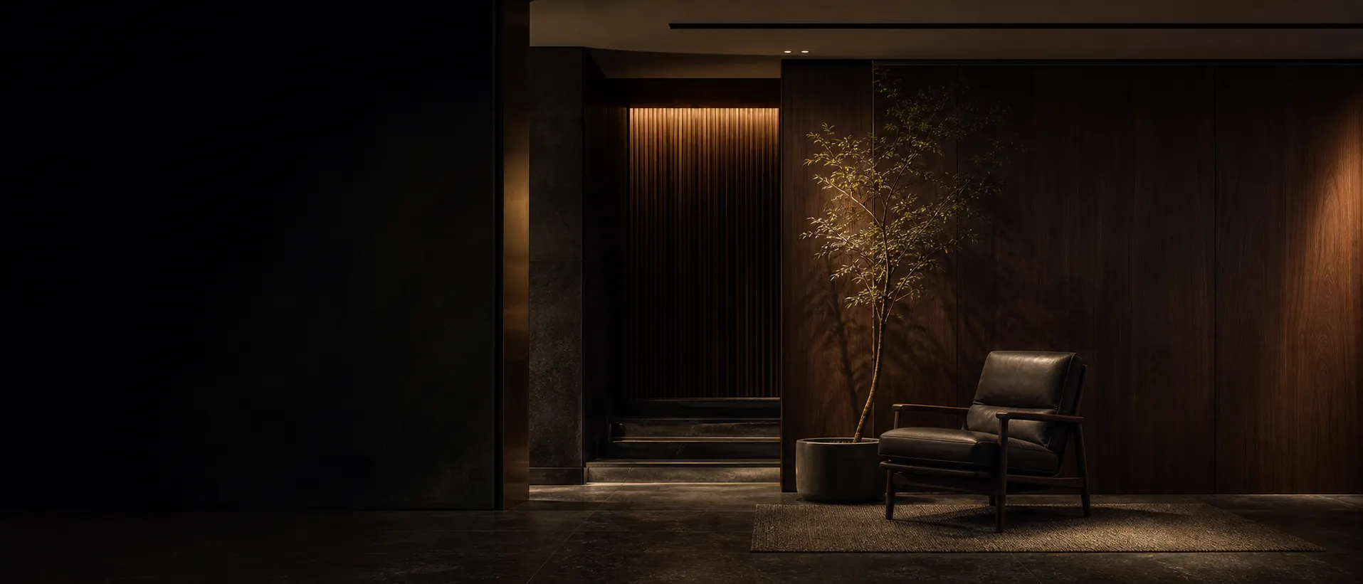 A warm Project Zero interior crafted in dark walnut and aged brass